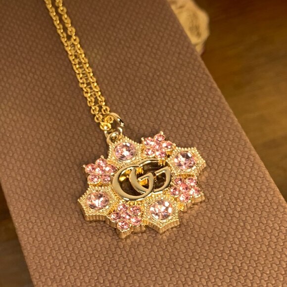 Gucci Snowflake Bag Charm Necklace - Picture 1 of 8